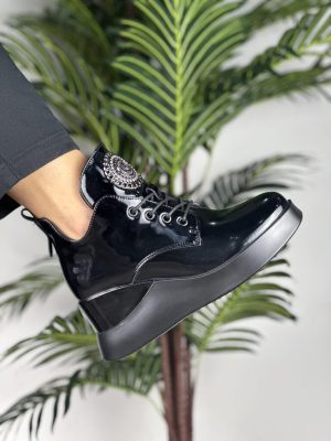 Skórzane botki damskie na koturnie Vinceza 66706 - Styl casualowy